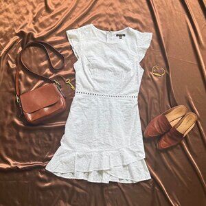 White lace flutter sleeve dress with ruffle hem